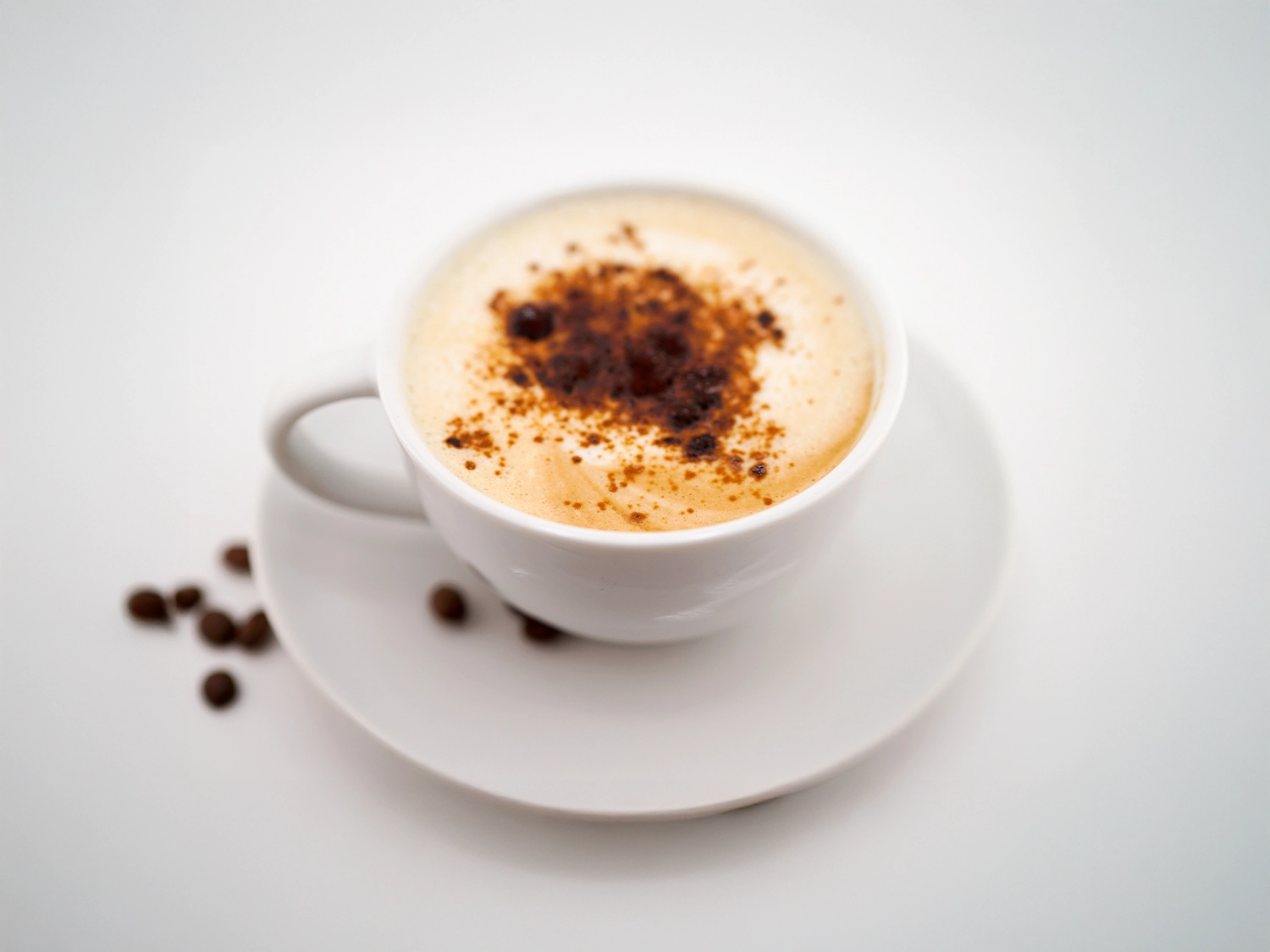 Interface de jeu Pampago Casino montrant une machine à sous et un café